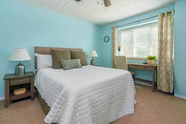 6447 Cranston Way Unit 19, Dublin, OH 43017 - carpeted bedroom with a textured ceiling and ceiling fan