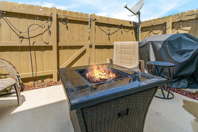 6447 Cranston Way Unit 19, Dublin, OH 43017 - view of patio / terrace with grilling area and a fire pit