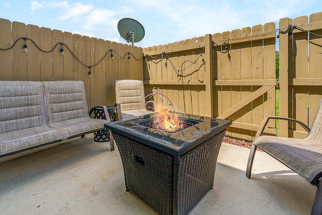 6447 Cranston Way Unit 19, Dublin, OH 43017 - view of patio featuring an outdoor fire pit
