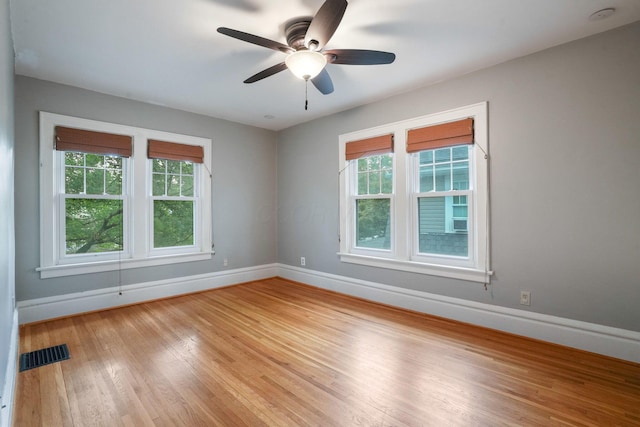 41 Northmoor Pl, Columbus, OH 43214 - empty room featuring plenty of natural light, light wood-style floors, ceiling fan, and a smoke detector