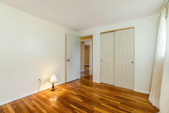 6280 Chelmsford Sq E, Columbus, OH 43229 - unfurnished bedroom featuring wood finished floors and a closet