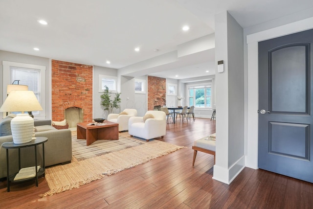 1867 Bryden Rd, Columbus, OH 43205 - living area featuring a fireplace, wood-type flooring, and recessed lighting