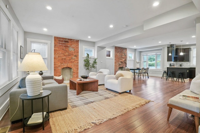1867 Bryden Rd, Columbus, OH 43205 - living room with a fireplace, hardwood / wood-style flooring, and recessed lighting