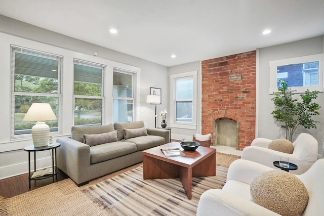 1867 Bryden Rd, Columbus, OH 43205 - living area with light wood-style flooring, a fireplace, and recessed lighting