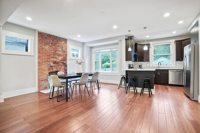 1867 Bryden Rd, Columbus, OH 43205 - dining room featuring light wood-style floors and recessed lighting