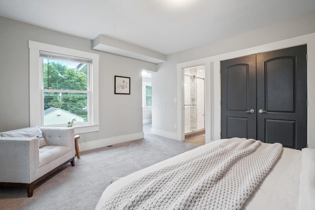 1867 Bryden Rd, Columbus, OH 43205 - bedroom featuring light colored carpet and ensuite bathroom