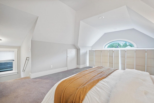 1867 Bryden Rd, Columbus, OH 43205 - carpeted bedroom with vaulted ceiling and baseboards