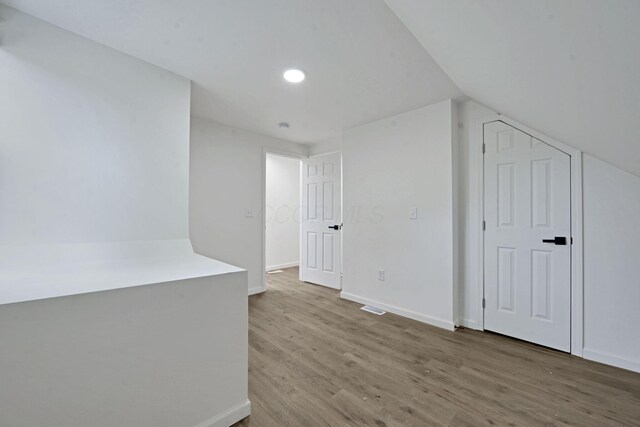 863 Carpenter St, Columbus, OH 43206 - additional living space featuring wood finished floors and recessed lighting