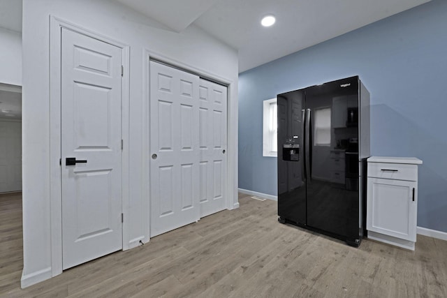 863 Carpenter St, Columbus, OH 43206 - hallway with light wood finished floors and baseboards