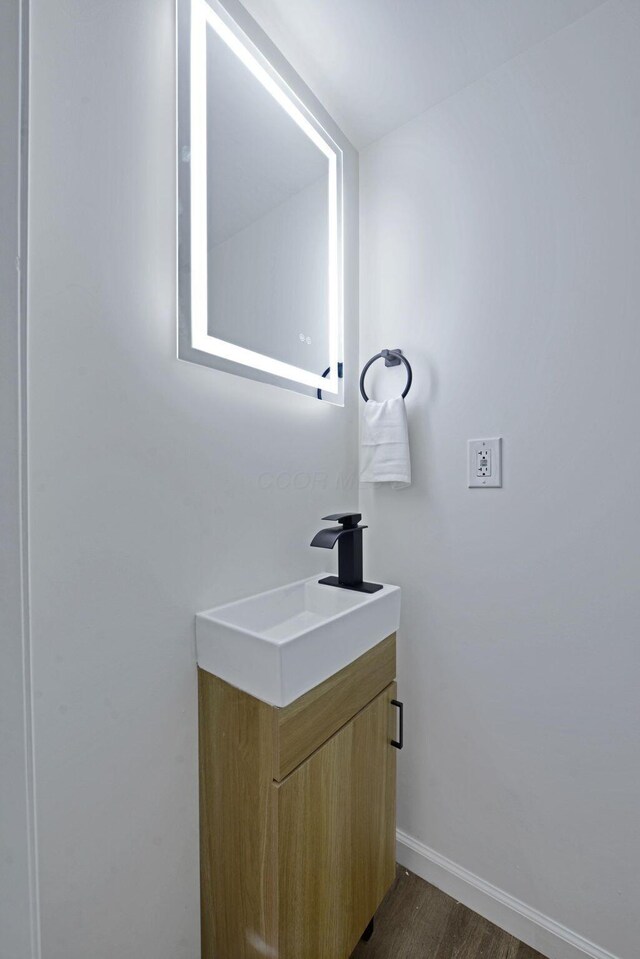 863 Carpenter St, Columbus, OH 43206 - bathroom with vanity and wood finished floors