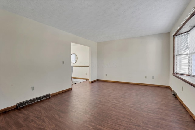 6464 Blackhaw Dr, Reynoldsburg, OH 43068 - spare room featuring wood finished floors and a textured ceiling