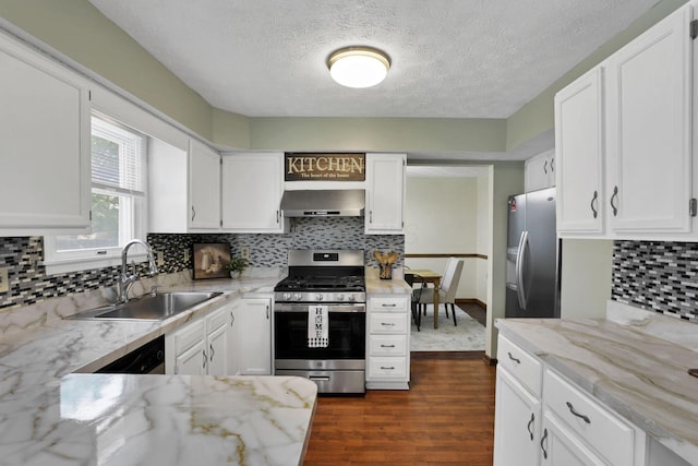 6464 Blackhaw Dr, Reynoldsburg, OH 43068 - kitchen with appliances with stainless steel finishes, wall chimney exhaust hood, dark wood finished floors, white cabinetry, and a textured ceiling