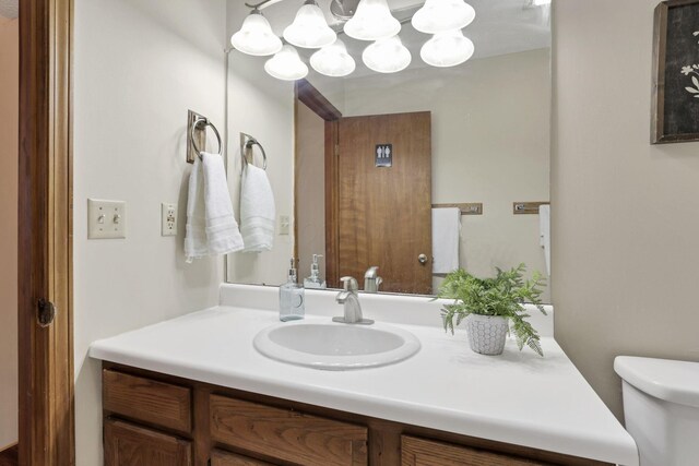 6464 Blackhaw Dr, Reynoldsburg, OH 43068 - bathroom with vanity and a chandelier
