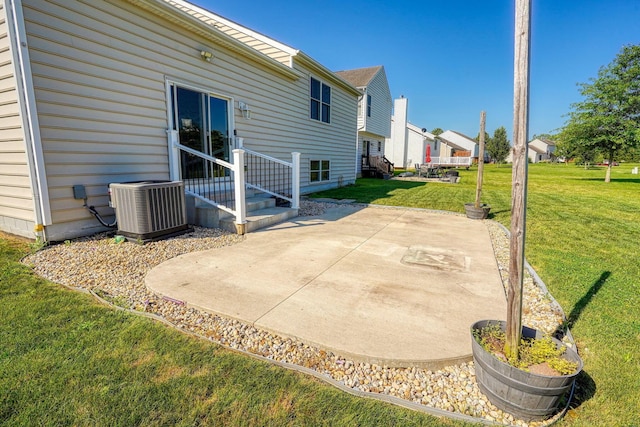 5700 Boucher Dr, Orient, OH 43146 - rear view of house with a patio, a lawn, and a residential view