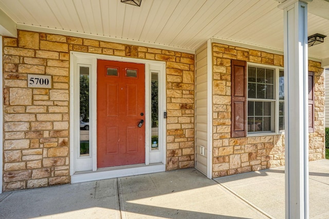 5700 Boucher Dr, Orient, OH 43146 - view of exterior entry featuring stone siding and covered porch