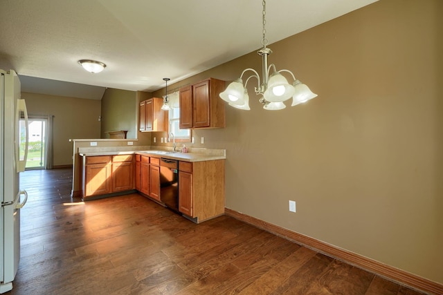 5700 Boucher Dr, Orient, OH 43146 - kitchen featuring freestanding refrigerator, dishwasher, dark wood-style floors, and a chandelier