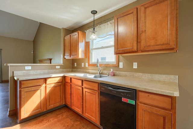 5700 Boucher Dr, Orient, OH 43146 - kitchen featuring black dishwasher, a peninsula, light wood-style floors, light countertops, and brown cabinetry