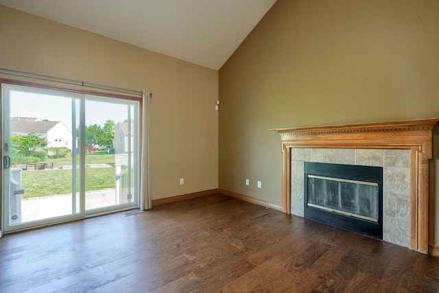 5700 Boucher Dr, Orient, OH 43146 - unfurnished living room with wood finished floors, a fireplace, and high vaulted ceiling