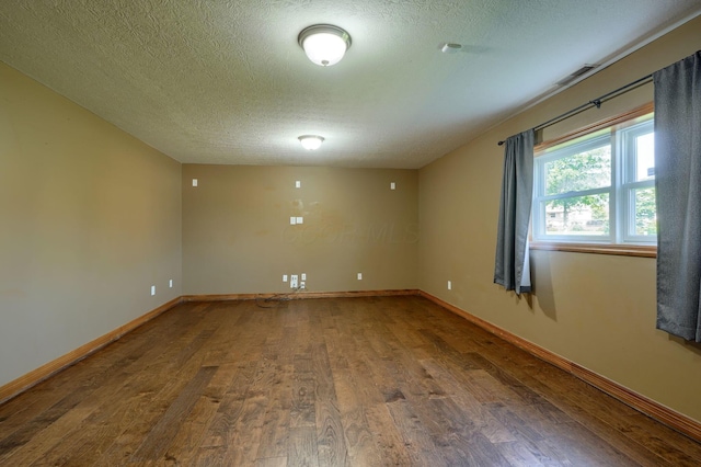 5700 Boucher Dr, Orient, OH 43146 - unfurnished room with wood finished floors and a textured ceiling