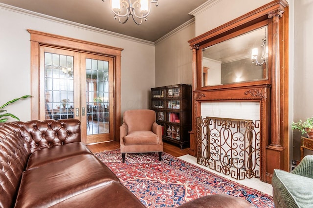 1412 Bryden Rd, Columbus, OH 43205 - sitting room with a chandelier, crown molding, wood finished floors, and french doors