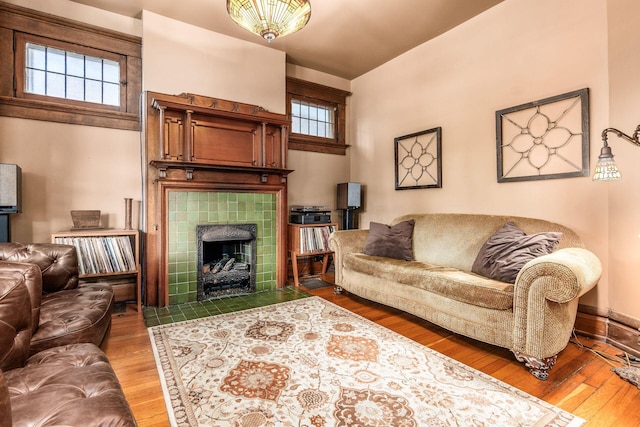 1412 Bryden Rd, Columbus, OH 43205 - living room with hardwood / wood-style flooring and a tile fireplace
