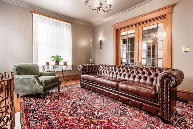1412 Bryden Rd, Columbus, OH 43205 - living room with a chandelier, wood finished floors, and ornamental molding