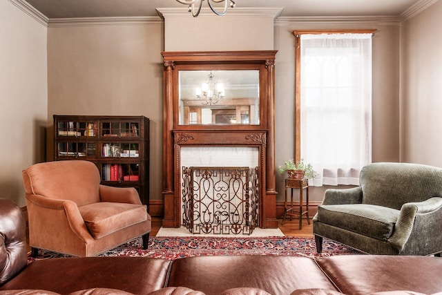 1412 Bryden Rd, Columbus, OH 43205 - living room featuring a chandelier, wood finished floors, ornamental molding, a large fireplace, and healthy amount of natural light