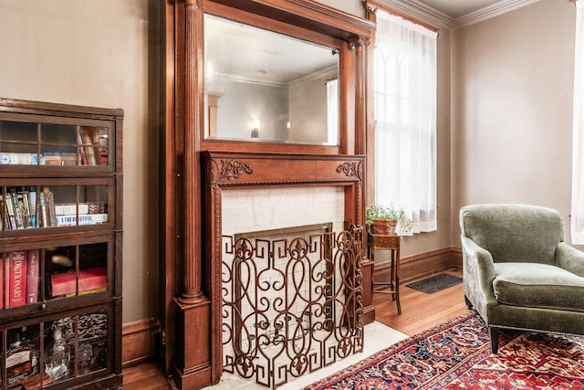 1412 Bryden Rd, Columbus, OH 43205 - sitting room featuring wood finished floors and ornamental molding
