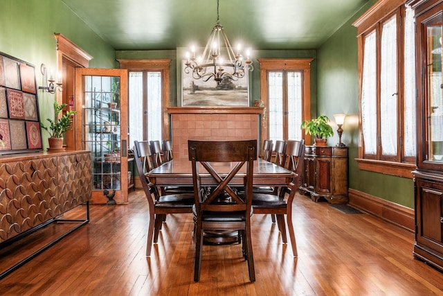 1412 Bryden Rd, Columbus, OH 43205 - dining space with a chandelier and hardwood / wood-style floors