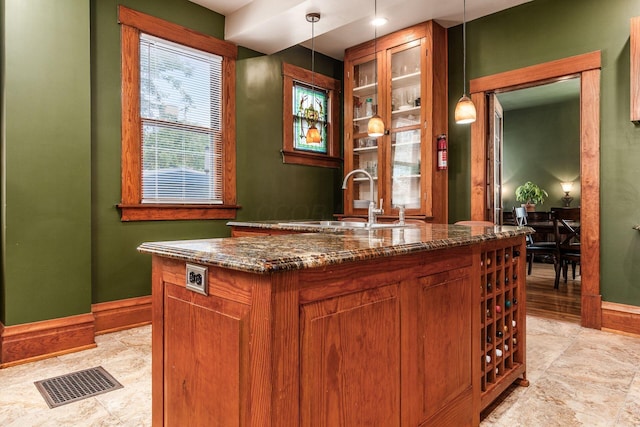 1412 Bryden Rd, Columbus, OH 43205 - bar area featuring a sink and pendant lighting