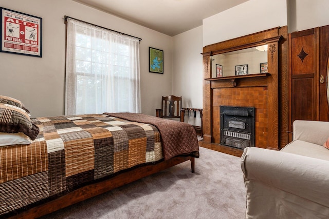 1412 Bryden Rd, Columbus, OH 43205 - carpeted bedroom featuring a fireplace