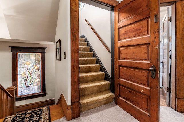 1412 Bryden Rd, Columbus, OH 43205 - staircase with carpet and vaulted ceiling