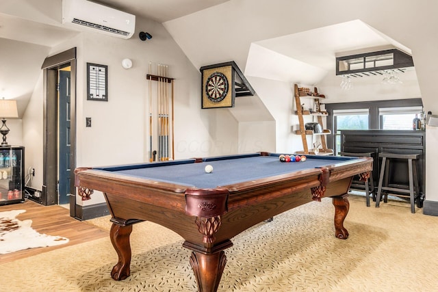 1412 Bryden Rd, Columbus, OH 43205 - rec room featuring a wall unit AC, vaulted ceiling, pool table, and wood finished floors