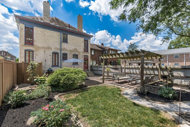1412 Bryden Rd, Columbus, OH 43205 - rear view of house with a pergola, a chimney, and a patio