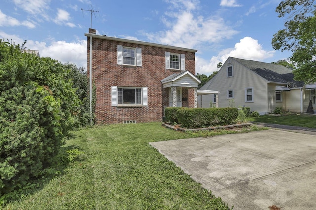 1444 N Columbus St, Lancaster, OH 43130 - view of front of property with brick siding, a chimney, and a front lawn