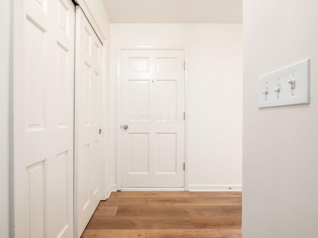 6019 Beechcroft Rd, Columbus, OH 43229 - hallway featuring light wood-style floors and baseboards