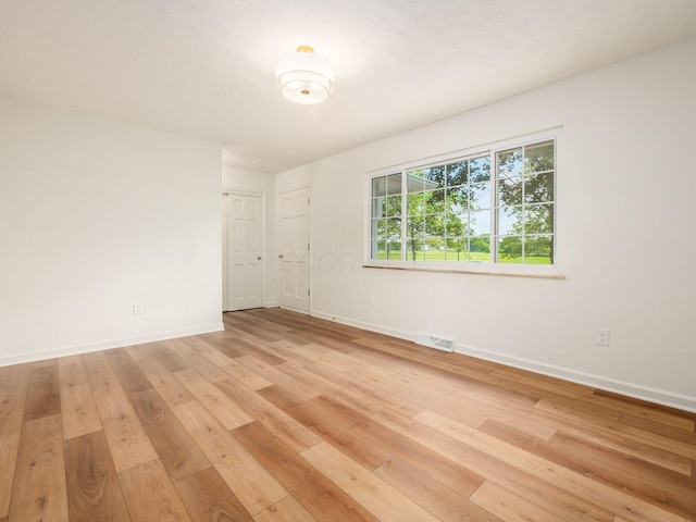 6019 Beechcroft Rd, Columbus, OH 43229 - spare room with light wood-style flooring and baseboards