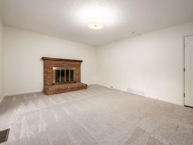 6019 Beechcroft Rd, Columbus, OH 43229 - unfurnished living room with carpet floors, a textured ceiling, and a brick fireplace