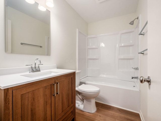 6019 Beechcroft Rd, Columbus, OH 43229 - full bath featuring vanity, wood finished floors, and shower / washtub combination