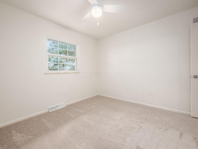 6019 Beechcroft Rd, Columbus, OH 43229 - empty room featuring light carpet and a ceiling fan