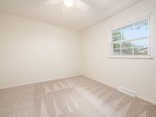 6019 Beechcroft Rd, Columbus, OH 43229 - carpeted empty room with baseboards and a ceiling fan