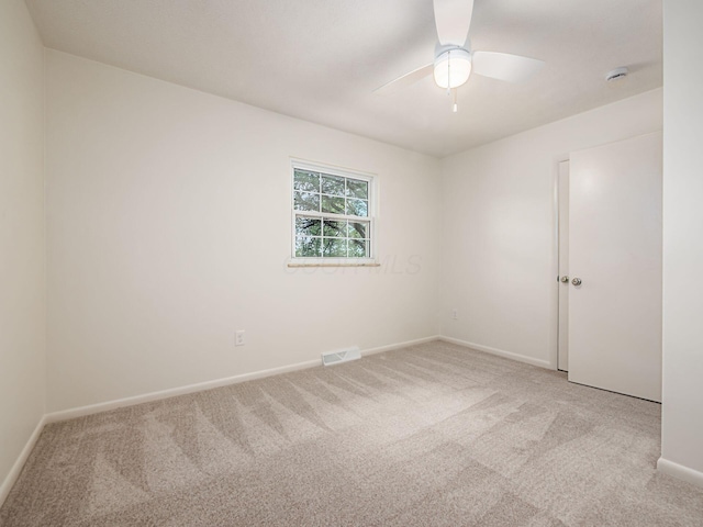 6019 Beechcroft Rd, Columbus, OH 43229 - empty room with light colored carpet, a smoke detector, and a ceiling fan