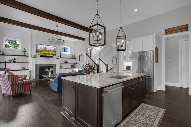 7211 Craigens Ct, Plain City, OH 43064 - kitchen with stainless steel appliances, dark wood-type flooring, light stone countertops, plenty of natural light, and recessed lighting