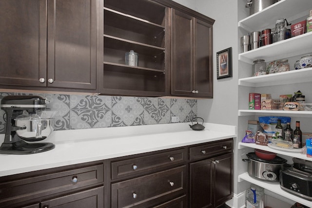 7211 Craigens Ct, Plain City, OH 43064 - kitchen with open shelves, dark brown cabinets, backsplash, and light countertops