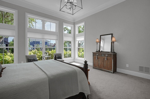 7211 Craigens Ct, Plain City, OH 43064 - carpeted bedroom featuring crown molding and a chandelier