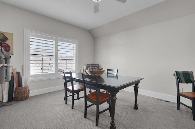 7211 Craigens Ct, Plain City, OH 43064 - dining room with light carpet, a ceiling fan, and vaulted ceiling