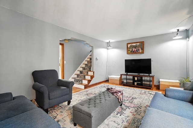 613 Salisbury Rd, Columbus, OH 43204 - living area featuring stairway and wood finished floors