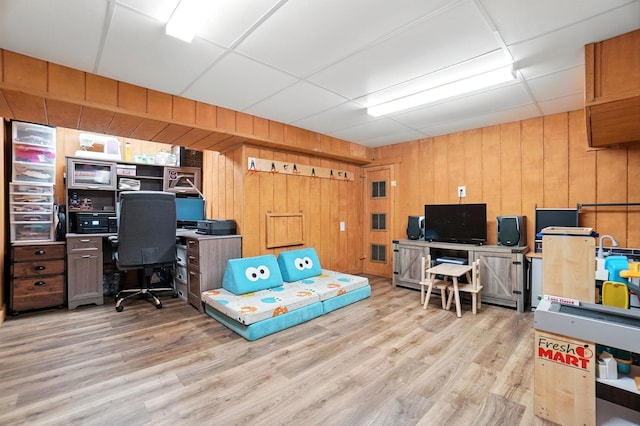 613 Salisbury Rd, Columbus, OH 43204 - home office with wood walls and light wood-style flooring