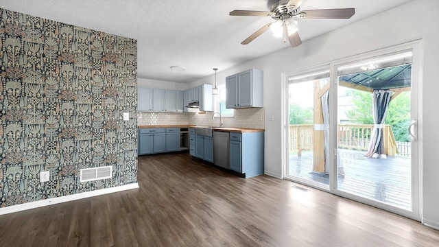 3099 Ambarwent Rd, Reynoldsburg, OH 43068 - kitchen with wood counters, dark wood-style floors, backsplash, and ceiling fan