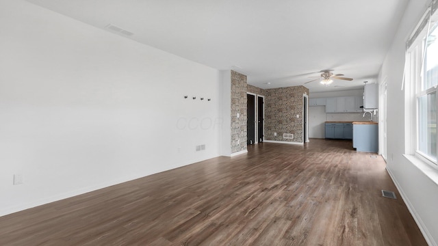 3099 Ambarwent Rd, Reynoldsburg, OH 43068 - unfurnished living room with dark wood-type flooring and a ceiling fan